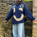 Oversized sweaters with smiley face design